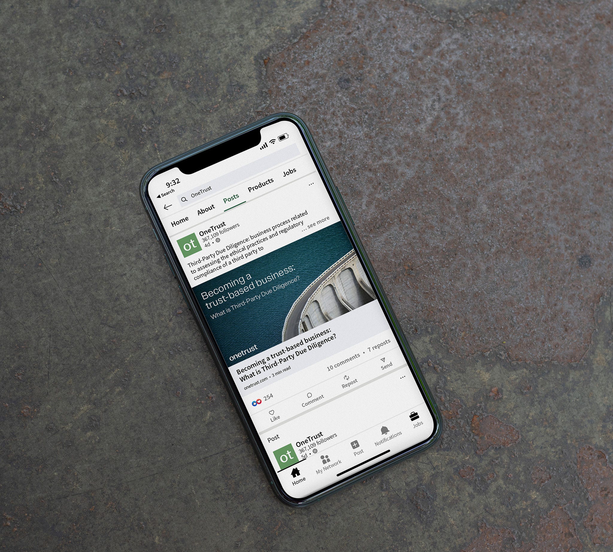 Mobile phone displaying LinkedIn search results for OneTrust