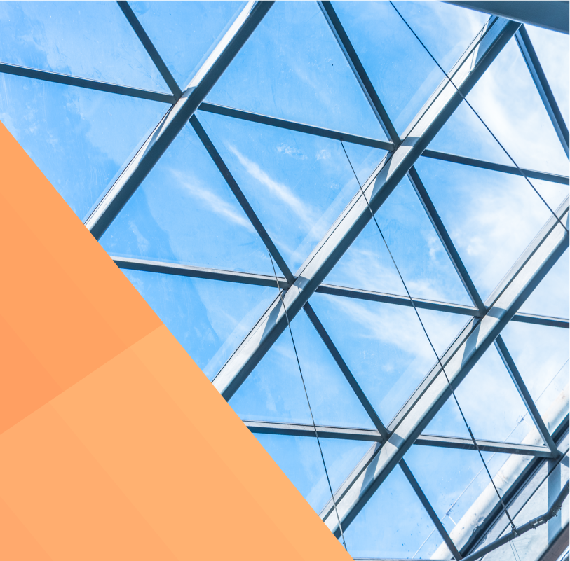 photo of a low angle view of glass ceiling with metal muntin bars.