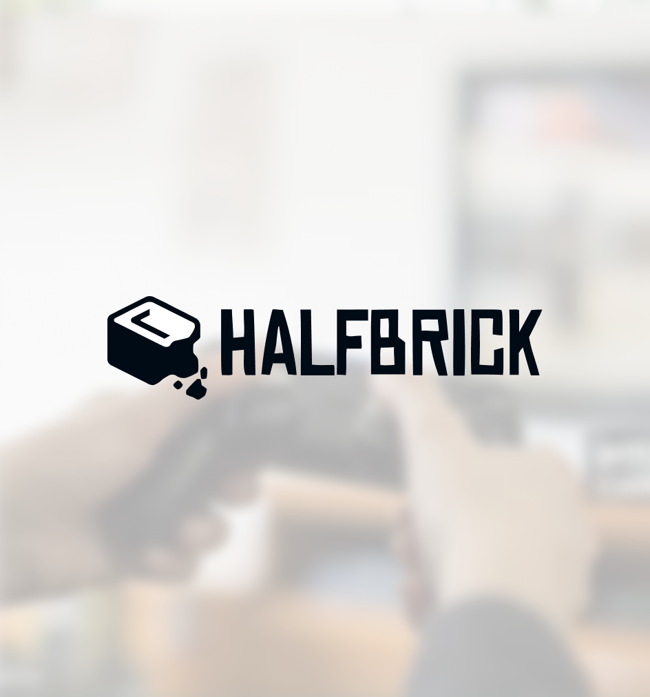 Blurred image of a person holding a gaming controller with the Halfbrick logo overlaid on top.